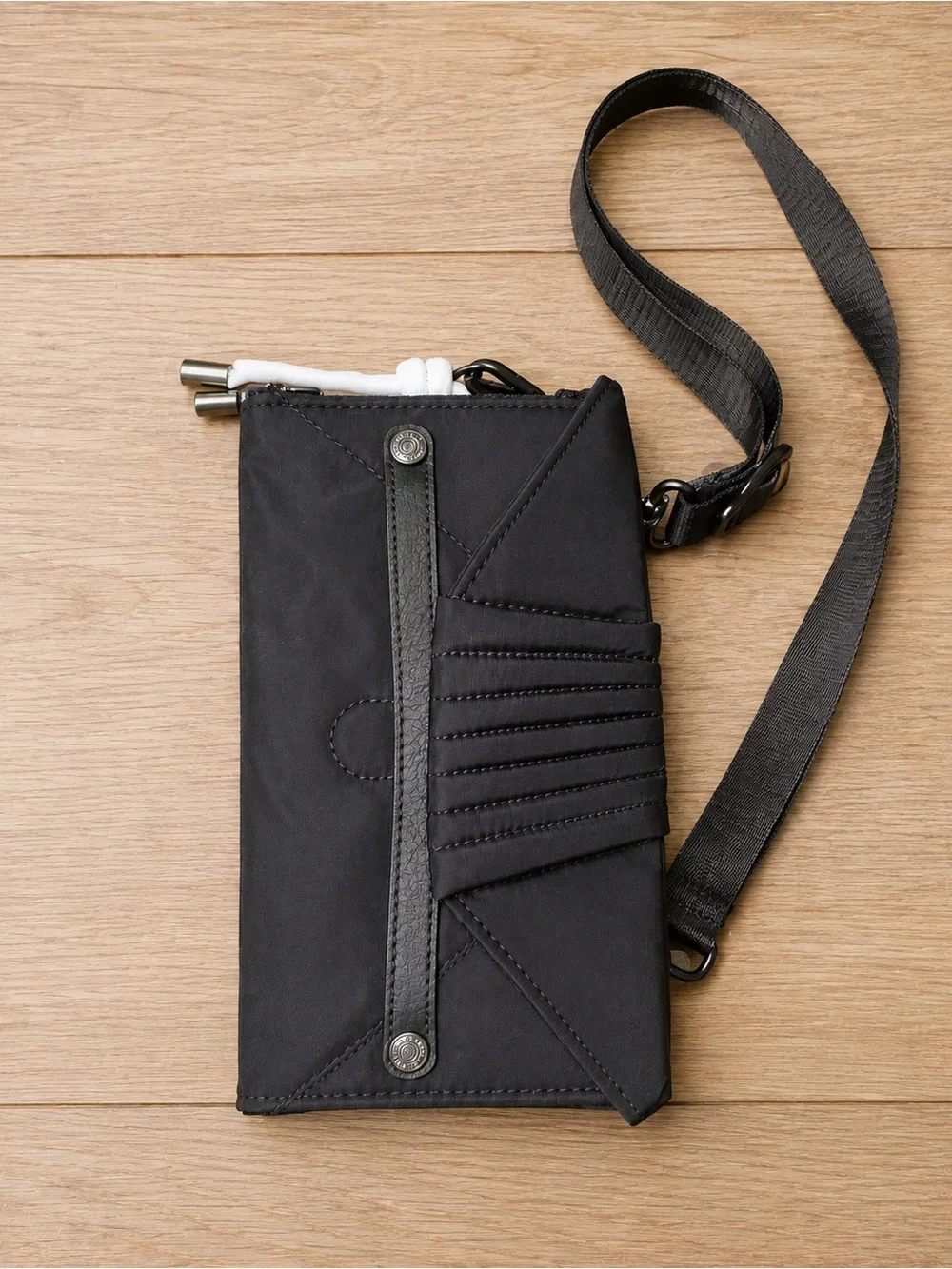 Kipling Black Quilted-Accent Crossbody with Tassel Charm